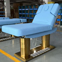 Table de massage électrique moderne de luxe incurvée pour extensions de cils, chaise de salon, canapé de massage de salon de beauté, lit cosmétique blanc en acier inoxydable