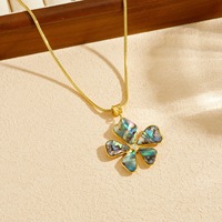 Collier pendentif fleur en coquille d'ormeau en acier inoxydable, pendentif Paua irisé plaqué or 18 carats, bijoux bohèmes inaltérables