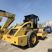 Rouleau vibratoire d'occasion Caterpillar CS583D/CS683E/CS76B/CS79B/CS533E/CS-863E à double tambour, moteur diesel, modèle 2022, origine USA, 97KW
