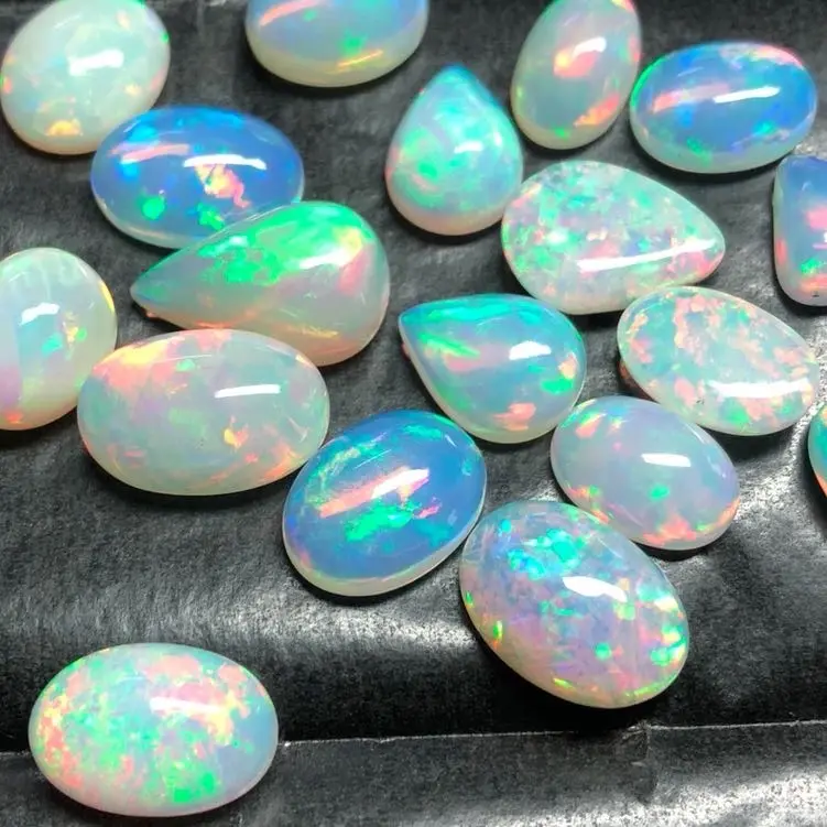 Per Karaat Natuurlijke Witte Ethiopische Opal Stone Smooth Losse Mix Vorm Cabochon Vorm Fabrikant Leverancier Voor Fabriek Prijs Online