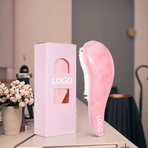 Zachte ontklittende paddleborstel met aangepast logo, ABS, antistatisch, gevleugeld design, haarmassageborstel - Product Image 1