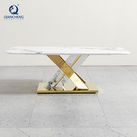 Table basse rectangulaire en marbre de luxe moderne haut de gamme avec base en forme de X pour le salon intérieur, design unique
