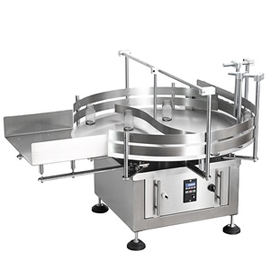 โต๊ะหมุนอัตโนมัติสำหรับขวดกลมขนาดเล็กพร้อมโต๊ะรับขวดสำหรับสายการบรรจุ ปิดฝา และติดฉลาก - Product Image 1