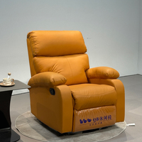 Fauteuil inclinable moderne orange avec fonctions de massage et de balancement, housse amovible, électrique, une place, revêtement en tissu, structure métallique