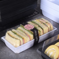 Boîte d'emballage alimentaire jetable en PET de qualité alimentaire, transparente, rectangulaire, pour sandwichs, gâteaux roulés, viandes séchées, mousses et pâtisseries.