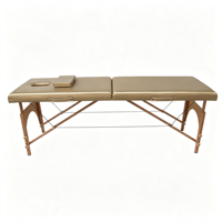 Table de massage pliante de luxe à 2 sections, pieds en bois, lit de spa portable pour usage professionnel