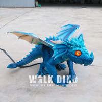 Dragon volant occidental grandeur nature personnalisable pour l'extérieur avec modèle de bébé pour la décoration des parcs à thème, des aéroports et des écoles, télécommande