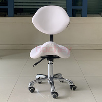 Tabouret rond pivotant et relevable en PU noir de gros de l'usine Hochey, tabouret mobile pour médecin, tabouret rond pour salon de beauté avec dossier