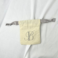 Pochette à cordon personnalisée avec logo, petit sac de rangement exquis pour un emballage élégant