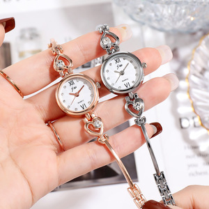 Montre analogique à quartz élégante de luxe pour femmes JW, avec strass, petit cadran en cristal, bracelet en acier inoxydable, résistante à l'eau, tendance pour femmes - Product Image 1
