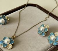 Parures de bijoux vintage pour femmes en cuivre avec perles d'eau douce et motif floral, idéales pour le quotidien