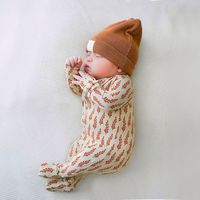 Pyjamas à fleurs imprimés OEM ODM pour bébé Logo personnalisé Barboteuse pour nouveau-né Couchette en bambou Vêtements décontractés pour bébé