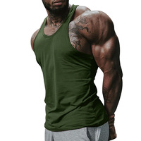 Vente en gros de maillots de corps personnalisés pour homme en coton blanc sans couture pour fitness et musculation