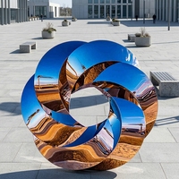 Grande sculpture en acier inoxydable en forme de fleur circulaire décorée pour l'extérieur