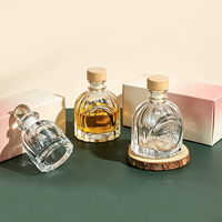 Flacon d'arôme en verre de luxe 50ml 100ml, différents bouchons, bâtonnets en rotin, logo OEM