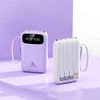 Batterie externe portable 10000 mAh avec câble intégré 4-en-1, puissance de sortie 10W, double éclairage LED et ports USB pour tous les téléphones