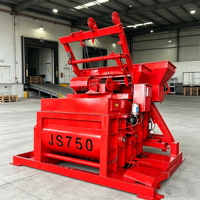 Mixer Beton JS750 Twin Shaft 750L 35m3/jam Warna Kuning dengan Panel Kontrol Digital dan Tombol Stop Darurat