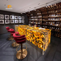 Comptoir de bar lumineux pour îlot de cuisine avec armoire à vin en quartz cristal jaune naturel translucide