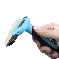 Râteau de toilettage professionnel OEM ODM pour animaux de compagnie, outil personnalisé réduisant efficacement les pertes de 95%
