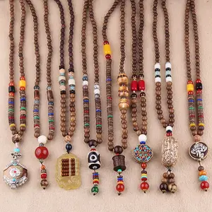 NUORO collana di perline colorate in legno di Bodhi naturale in stile etnico per donna collana con ciondolo in legno di Buddha Nepal fatto a mano da uomo