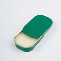 Boîte en fer blanc de luxe verte en gros avec couvercle coulissant personnalisé, boîte métallique sophistiquée pour baume de parfum solide