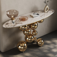Mesa Consola de Diseño Moderno para el Hogar con Estructura Dorada y Tapa de Mármol en Forma de Elipse