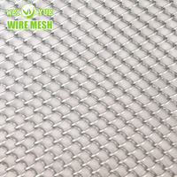 Rideau en maille spirale de draperie de bobine en métal résistant à la corrosion pour entrepôt/cloison de studio/revêtement mural décoratif/ombre de fenêtre