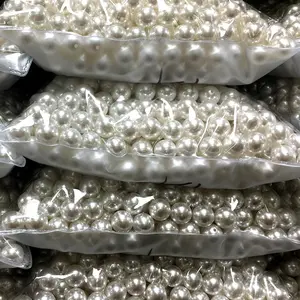 Perles en plastique rondes de Super qualité avec trou pour vêtements, perles en vrac rondes en plastique ABS