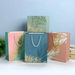 Custom Flower-<b>Patterned</b> <b>Paper</b> Gift Bags High-End Souvenir Bags Clothing Boutique Shopping Bags Wholesale Supplier - Product Image 1