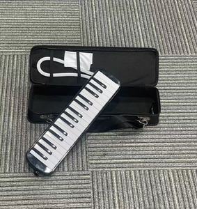 Melódica al por mayor de fábrica, 32/37 teclas, logotipo personalizado, instrumento musical de viento con caja de regalo para distribuidores escolares - Product Image 3
