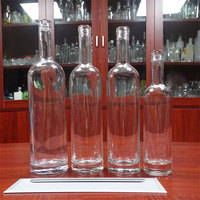 Bouteilles en verre transparentes cylindriques de 70 cl pour whisky, vodka et spiritueux à vendre