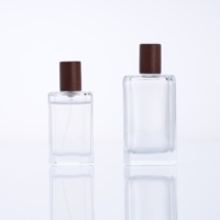 Bouteilles de parfum carrées classiques de liquidation avec le chapeau en bois 25ml 50ml 100ml