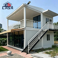 Villa modulaire de luxe à plusieurs étages en structure acier, design moderne, pour usage hôtelier ou maisonnette.