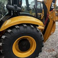 Mesin Backhoe Loader Caterpillar CAT 430F dengan Bucket Loader Depan dan Attachment Excavator Belakang Siap Kerja