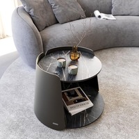 Table basse ronde à double niveau en pierre frittée de conception italienne moderne, écologique, avec rangement pour le salon