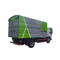 Camion broyeur de matériaux Dongfeng 10m³ à benne fermée intégrée pour broyage et transport efficaces des déchets de jardin et de construction