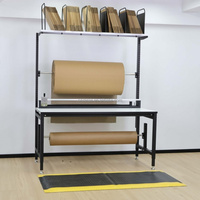 Station de travail ergonomique en acier DETALL avec support pour coupe-matériaux et support de matériaux pour les centres logistiques