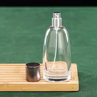 Flacon pulvérisateur en verre personnalisé avec impression UV, service d'échantillons flexible, flacon de parfum pour les vendeurs de marques de parfums transfrontalières