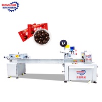 Machine d'emballage horizontale automatique à grande vitesse pour bonbons durs en forme de coussin et sucettes
