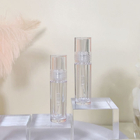 Tubes transparents de brillant à lèvres d'injection ronde de logo personnalisé emballage cylindrique vide de maquillage cosmétique avec usage artisanal