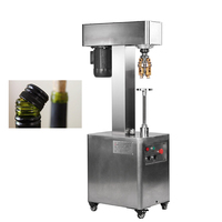 Machine manuelle de scellage de bouchons de bouteilles de vin pour fermer les bouteilles en verre avec un bouchon en aluminium