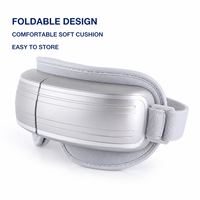 Masseur oculaire chauffant personnalisé OEM ODM avec pression d'air, vibration, musique, 5 modes, pliable, sans fil, rechargeable par Type-C