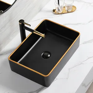 カスタムデザインカウンタートップマットブラックセラミックバスルームシンクモダンブラックとゴールドラインアート洗面台