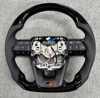 Les fabricants fournissent un ensemble de volant LC300 Piano Black pour l'ensemble de volant LC Alpha en fibre de carbone