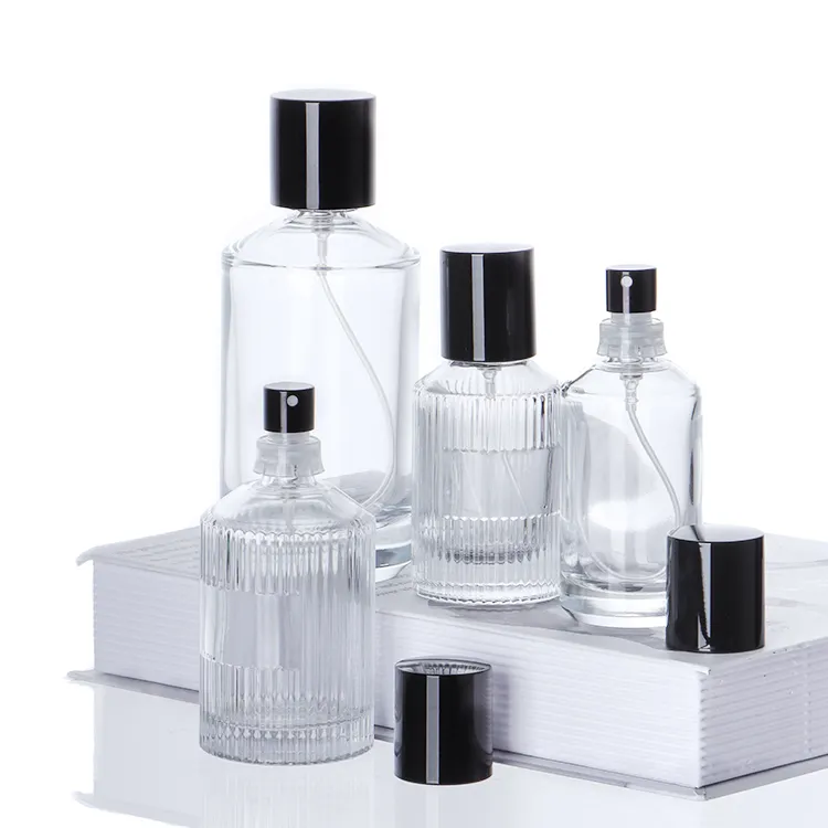 Venta al por mayor de alta calidad de lujo claro 30ml 50ml 100mL botella de perfume de vidrio con bomba de pulverización
