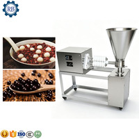 Machine automatique de fabrication de boules de riz avec machine de recouvrement et de roulage pour les boules énergétiques, les boules de sésame, les mochi