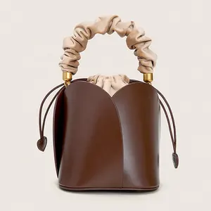 Fashionable retro leather cross-slung one-shoulder portable large-capacity flower bag designer petal bucket bag