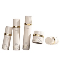 Emballage de soins de la peau de luxe haut de gamme, flacons en verre cylindriques de 100 ml de haute qualité avec pompe pour cosmétiques, sérums, diffuseurs