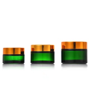 ขวดแก้วบรรจุภัณฑ์เครื่องสำอางแบบพกพาใส ขนาด 5G 10G 15G 20G 30G 50G 60G 100G พร้อมฝาสีทอง ขายส่ง - Product Image 2