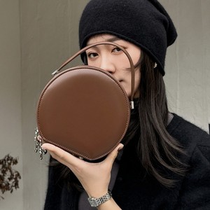 Sac à main rond au design élégant, sac de luxe en cuir véritable pour femme, sac simple et décontracté à porter à l'épaule ou en bandoulière - Product Image 1